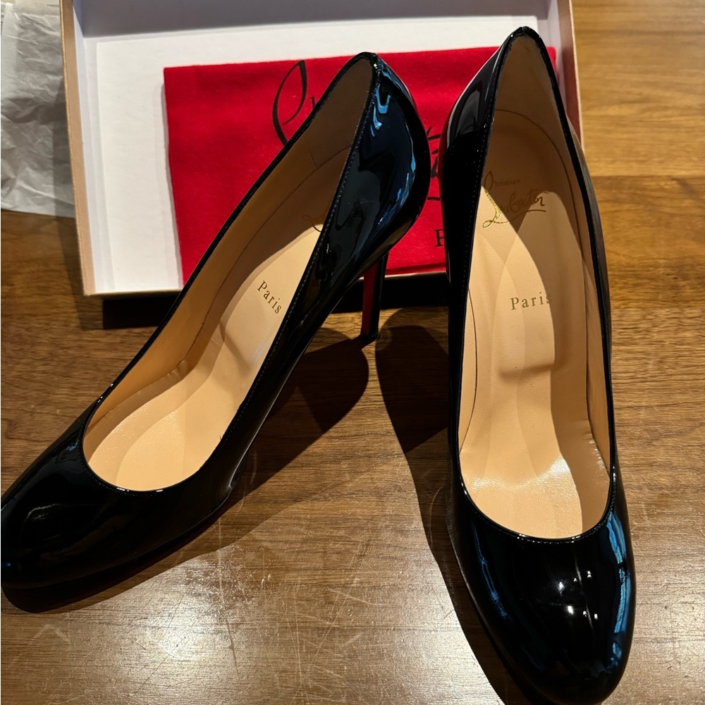 Christian Louboutin size 42 black heels. BRAND NEW IN BOX.